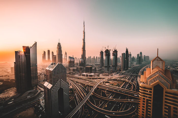 Illustrative photo: downtown Dubai towers in the early evening